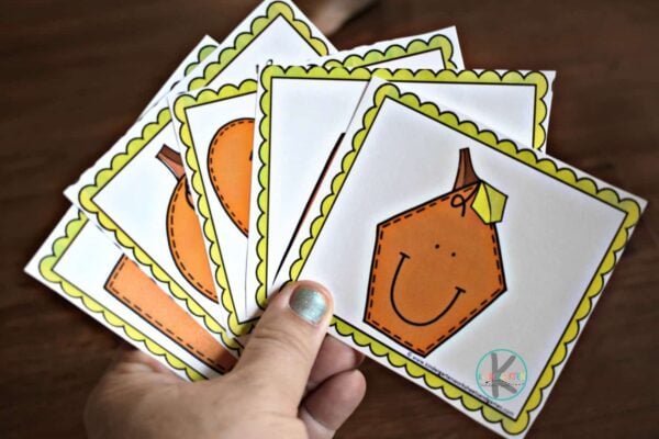 this pumpkin themed math game is a fun way for kindergartners to learn about shapes for kids